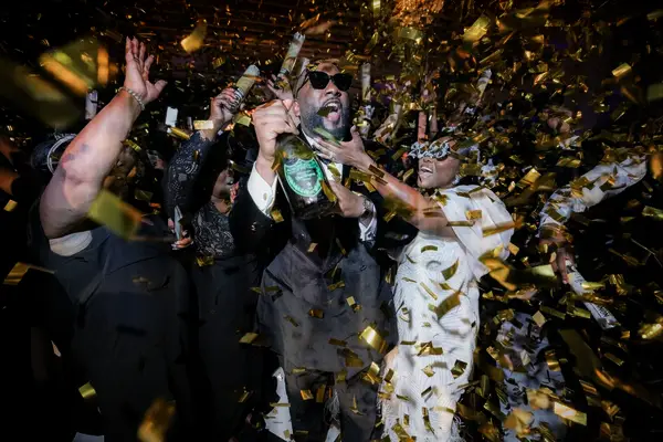Gold Confetti and Dom Perignon Champagne During New Year