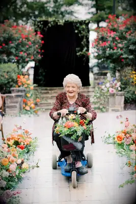 Grandma Processing into Ceremony on Electric Scooter