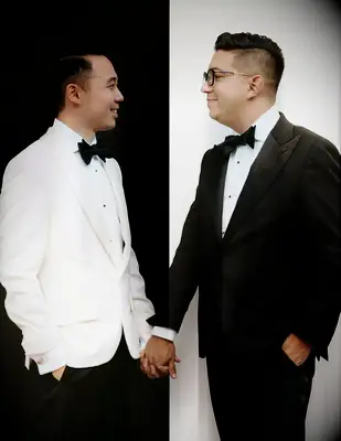 Offset Black-and-White Tuxedos With Classic Background for Two Grooms