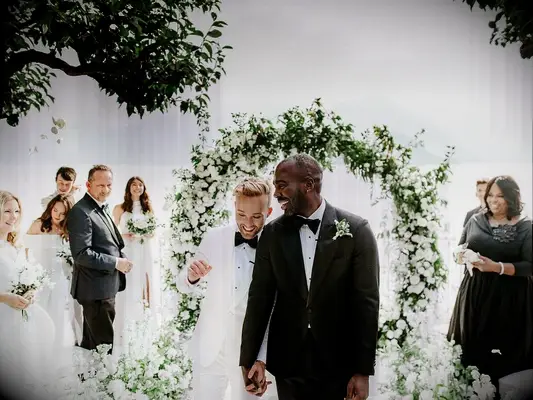 Couple walking down aisle in Italy