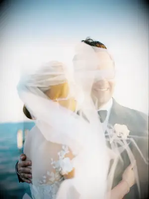 Couple hugging in the wind