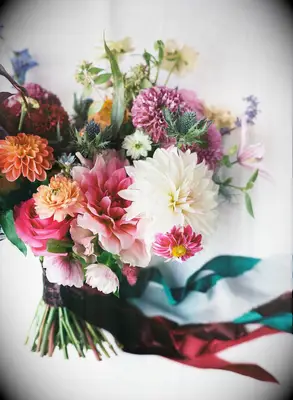 jewel-tone bouquet with ribbon