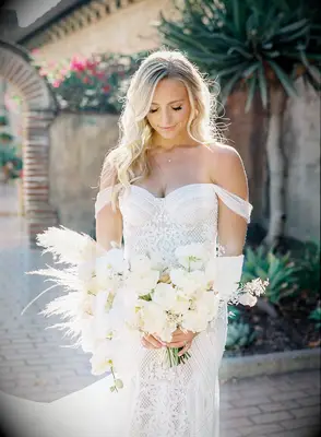 Bride holding white bouquet