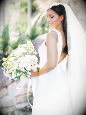 Bride holding white bouquet