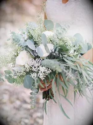 greenery wedding bouquet with bay leaves, spiral eucalyptus, silver dollar eucalyptus, brunia berries and white roses