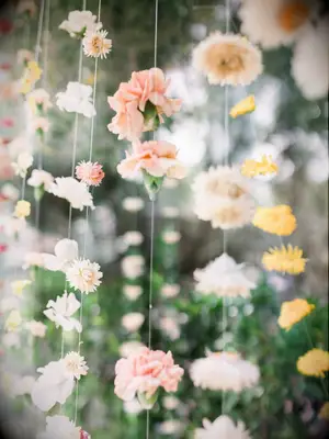 Carnation floral curtain on string at wedding reception