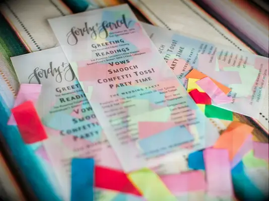 Wedding programs with confetti inside