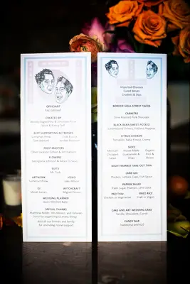 Wedding programs with caricatures of the couple