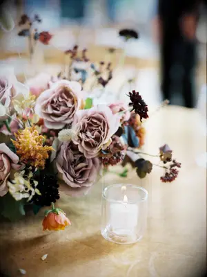 mauve fall wedding centerpiece with votive candle
