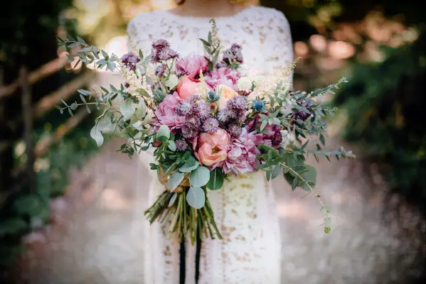Woman holding a large bouquet