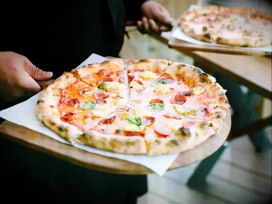 Passed brick oven pizza wedding appetizer