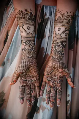 Bride with mehdni at Indian wedding