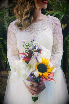 Red and White Stargazer Lilies With Sunflowers and Purple Aster