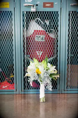 Fresh Lily Wedding Bouquet With Closed Buds and Dusty Miller