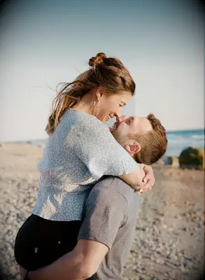 Couple nose kiss on a beautiful beach. 