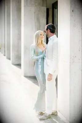 Couple in formalwear during romantic engagement photo shoot