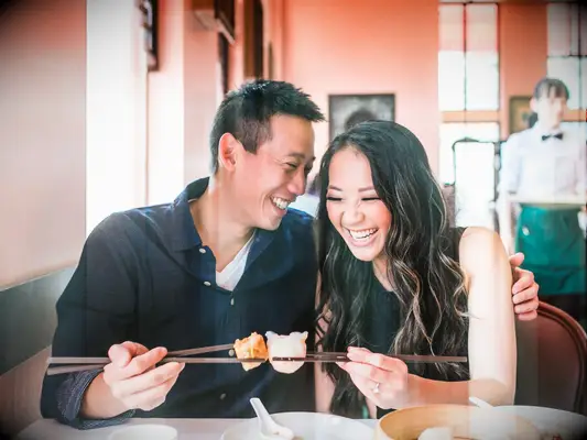 A Relaxed, Restaurant Engagement Photo Featuring Dim Sum