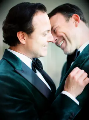 Formal engagement photo in tuxedos