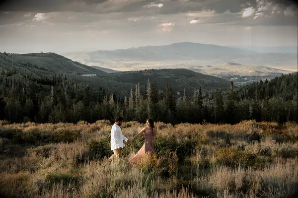 Wildflower and mountain engagement photoshoot