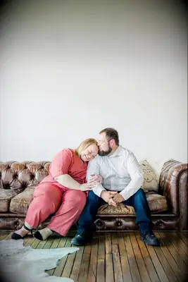 An intimate moment snuggling engagement photo