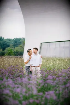 Field of purple flowers engagement photo ideas