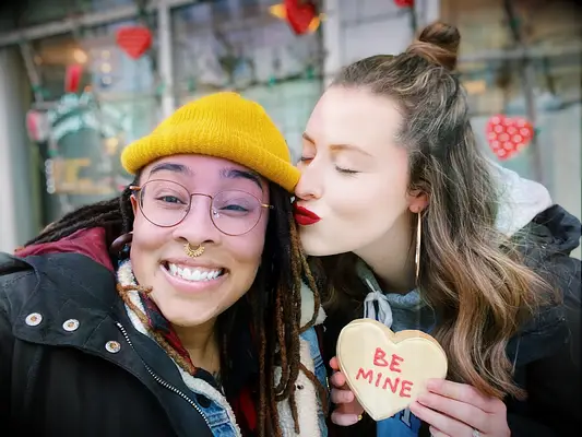 Cute couple selfie with Be Mine cookie
