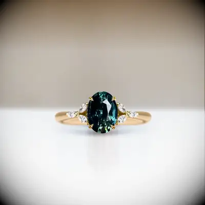 Nolan & Vada oval teal sapphire engagement ring