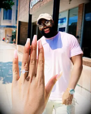 Couple engagement ring selfie 