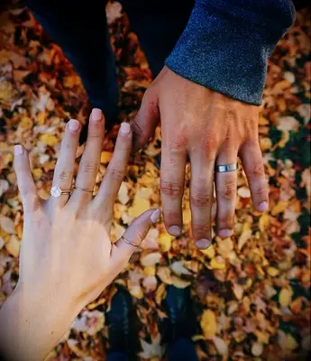 Engagement ring photo idea above fall leaves