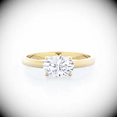 east-west set oval engagement ring
