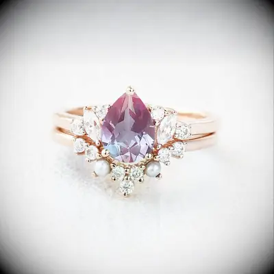Purple teardrop gem engagement ring