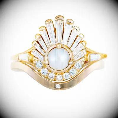 Seashell engagement ring with pearl and diamonds
