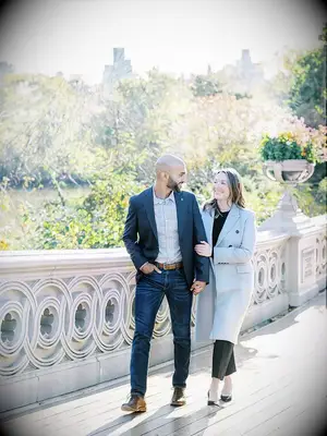 Couple strolling arm-in-arm in a park