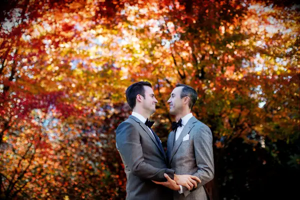 Two men gaze into each other