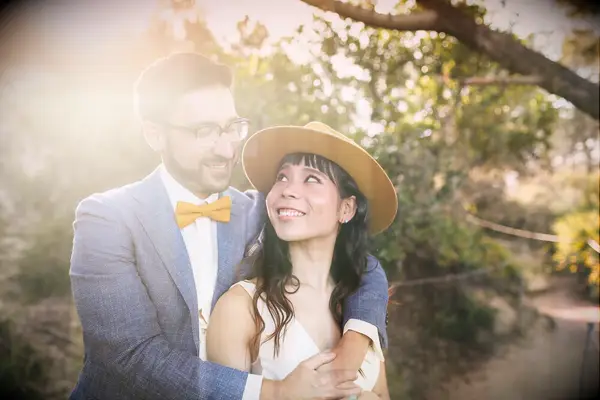 The happy couple gaze into each other