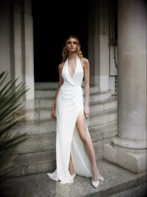 floor length gown with plunging neck and high slit