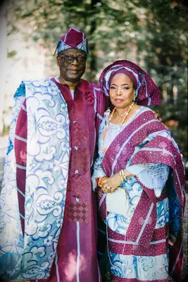 Couple wearing wearing matching burgundy and blue attire
