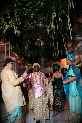 Guests dancing in traditional attire