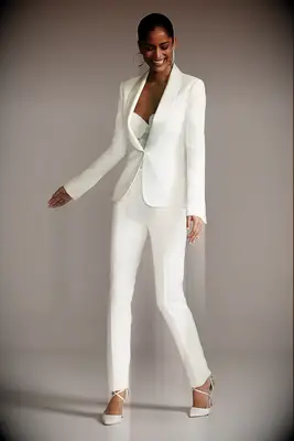 White shawl lapel tuxedo and white pants outfit for courthouse wedding from David