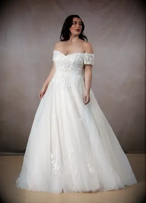 Romantic plus size wedding dress by Azazie. 