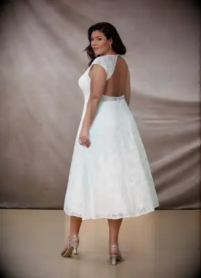Best mid length plus size wedding dress by Azazie. 