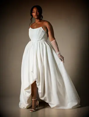 Strapless plus size wedding dress by ELOQUII. 