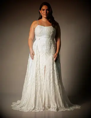 Sparkly plus size wedding dress by ELOQUII. 