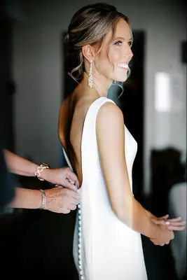 Bride getting dressed for her big day
