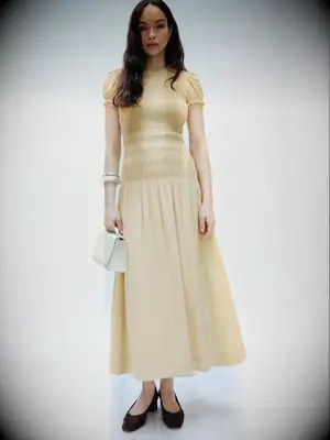 Yellow midi casual rehearsal dinner dress from Reformation