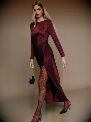 Red satin long sleeve rehearsal dinner guest dress from Reformation