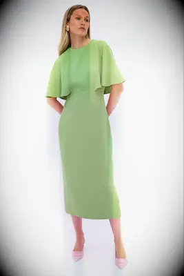 Pomander Place green cape cocktail rehearsal dinner guest dress from Tuckernuck