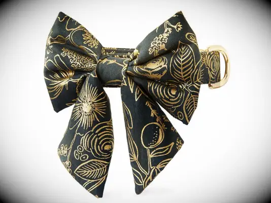 Dark green metallic dog collar with bow.