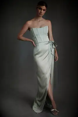 Strapless silk dress in a pale green color. Best pastel wedding dresses 2023-2024. 