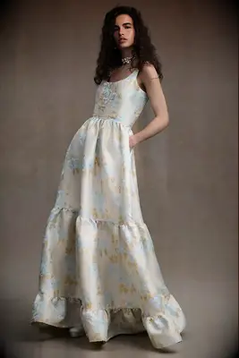 White wedding dress with a pastel floral print, best pastel wedding dresses 2023-2024. 